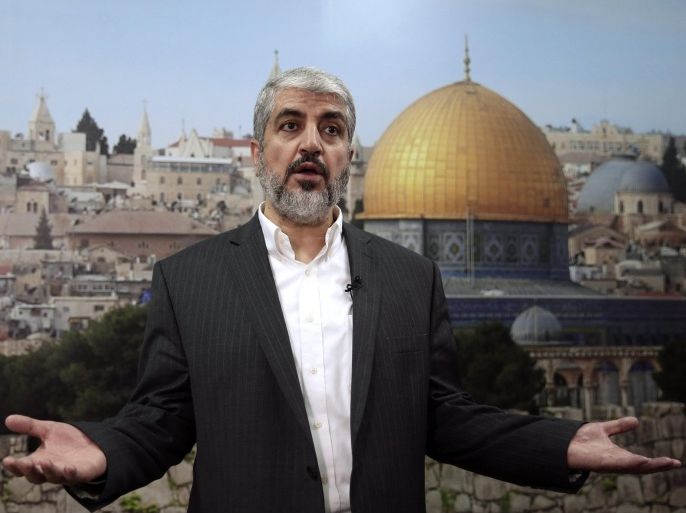 Hamas leader Khaled Meshaal speaks during an interview with Reuters in Doha October 16, 2014. Meshaal on Thursday called on Muslims to defend the al-Aqsa mosque compound in Jerusalem, saying Israel was trying to seize the site, revered in Islam and Judaism and focus of a Palestinian uprising in 2000. REUTERS/Fadi Al-Assaad (QATAR - Tags: POLITICS RELIGION)