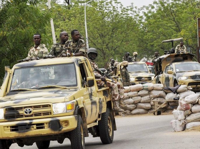 An undated photograph from 2014 made available 13 January 2015 shows members of the Nigerian military patrolling in Maiduguri, North East Nigeria. The Nigerian government said up to 150 people had been killed by Boko Haram in the country's north last week and dismissed widespread reports that 2,000 people had died.