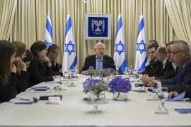 Israeli President Reuven Rivlin (C) consults with representatives of the Joint List, an alliance of four small Arab-backed parties, with its leader, Ayman Odeh (C-R with hand at chin), in the president's residence in Jerusalem, Israel, 22 March 2015, as he begins consultations will all the parties who won seats in the next Knesset (Parliament), in order to task a party leader to form the next government. Others are not identified.