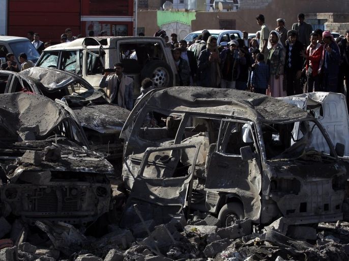 Yemenis gather beside vehicles which were allegedly destroyed by a Saudi air strike, in Sana'a, Yemen 26 March 2015. Saudi Arabia and other Gulf states launched air strikes against Houthi rebels which have taken over large parts of Yemen, attacking the Sana'a military Airport and Jiraf area, a Houthi stronghold. The strikes were 'in support of the people of Yemen and their legitimate government,' Saudi Arabia's Washington ambassador Adel al-Jubeir said. The military operation by a 'coalition of over 10 countries' was in response to an appeal from embattled Yemeni President Abdo Rabbo Mansour Hadi, al-Jubeir said.
