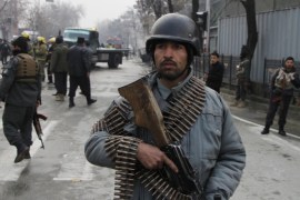 Afghan police secure the scene of a suicide bomb in Kabul, Afghanistan, 26 February 2015. A suicide bomber targeted a Turkish embassy vehicle with an explosives-laden car on 26 February near the Iranian embassy in a diplomatic area of Kabul city, police said. One person was injured in the incident according to reports.