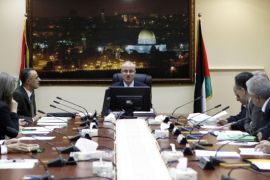 RAMALLAH, WEST BANK - JULY 15: Palestinian Prime Minister Rami Hamdallah (C) and Palestine ministerial cabinet take kindly of Egypt's ceasefire proposes which allows for talks which both sides considering it.