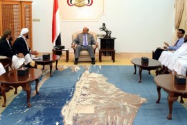A handout photo released by the Yemeni Presidency Office shows Yemeni President Abdo Rabbo Mansour Hadi (C) meeting with members of The Rashad Union Party, a Yemeni Salafi political party, in the presidential palace in the southern port city of Aden, Yemen, 19 March 2015. Media reports quoting security officials said on 19 March a compound in Aden used by Hadi came under attack by unidentified planes. Deadly clashes broke out between southern tribal militias loyal to Yemeni President Abbo Rabbo Mansour Hadi and security forces in Aden allegedly loyal to former President Ali Abdullah Saleh, killing at least seven people and forcing the closure of Aden's international airport. EPA/YEMENI PRESIDENCY OFFICE/HANDOUT