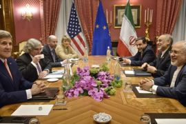 US Secretary of State John Kerry, left, US Secretary of Energy Ernest Moniz, 2nd left, head of the Iranian Atomic Energy Organization Ali Akbar Salehi, 2nd right, and Iranian Foreign Minister Javad Zarif, right, wait at the start of a meeting at the Beau Rivage Palace Hotel, in Lausanne, Switzerland, Saturday March 28, 2015. Negotiations over Iran's nuclear program picked up pace on Saturday with the foreign ministers of France and Germany joining U.S. Secretary of State John Kerry in talks with Iran's top diplomat ahead of a looming end-of-March deadline for a preliminary deal. (AP Photo/Brendan Smialowski, Pool)