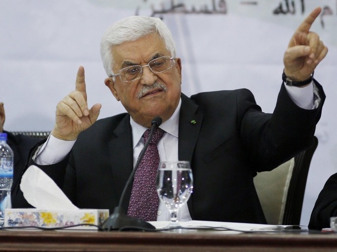 Palestinian President Mahmoud Abbas gestures as he speaks during a meeting for the Central Council of the Palestinian Liberation Organization, in the West Bank city of Ramallah, March 4, 2015. Palestinian leaders began a two-day meeting on Wednesday at which they could decide to suspend security coordination with Israel, a move that would have a profound impact on stability in the occupied West Bank. Relations between the two sides have grown dangerously brittle since the collapse of U.S.-brokered peace talks in 2014, with no immediate prospect of any resumption in negotiations. REUTERS/Mohamad Torokman (WEST BANK - Tags: POLITICS)