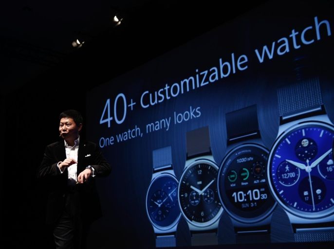 Richard Yu, chief executive officer of Huawei Technologies Co., unveils the new Huawei Watch wearable device during a news conference in Barcelona, Spain, on Sunday, March, 1, 2015. The event, which generates several hundred million euros in revenue for the city of Barcelona each year, also means the world for a week turns its attention back to Europe for the latest in technology, despite a lagging ecosystem.
