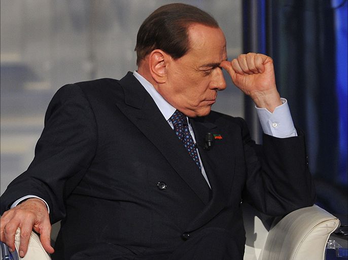 In this file picture taken on April 24, 2014 former Italian prime minister Silvio Berlusconi attends the "Porta a Porta" TV show at the Rai 1 headquarters in Rome. Italy's top court on March 10, 2015