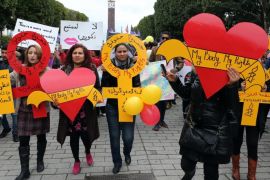 Tunisian women march while holding banners reading the slogan of Amnesty International campaign âmy body my rightsâ, during a demonstration on the International Women's Day, in Tunis, Tunisia, 08 March 2015. About one hundred women marched in the streets of Tunis shouting slogans demanding more freedom for Tunisian women. International Women's Day is globally observed on 08 March, in order to highlight the struggles of women across the globe and promote women's rights.