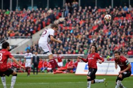 HANOVER, GERMANY - MARCH 07: Thomas Mueller of FC Bayern Muenchen heads the third goal during the Bundesliga match between Hannover 96 and FC Bayern Muenchen at HDI-Arena on March 7, 2015 in Hanover, Germany.