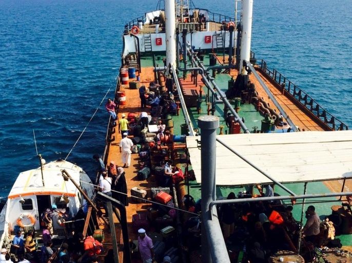 Passengers board the Yemeni-owned Sea Princess II oil tanker, chartered to carry people of various nationalities fleeing Aden, as Houthi fighters advanced on the city April 1, 2015. As Shi'ite Muslim fighters closed in on Aden to confront President Abd-Rabbu Mansour Hadi and his supporters, they cut off all escape routes by road and foreigners in the city began jostling for a way out. Many arrived to waiting navy ships sent by their own governments to evacuate them. Others searched desperately for any boat to carry them to safety. Picture taken April 1, 2015. REUTERS/Sami Aboudi