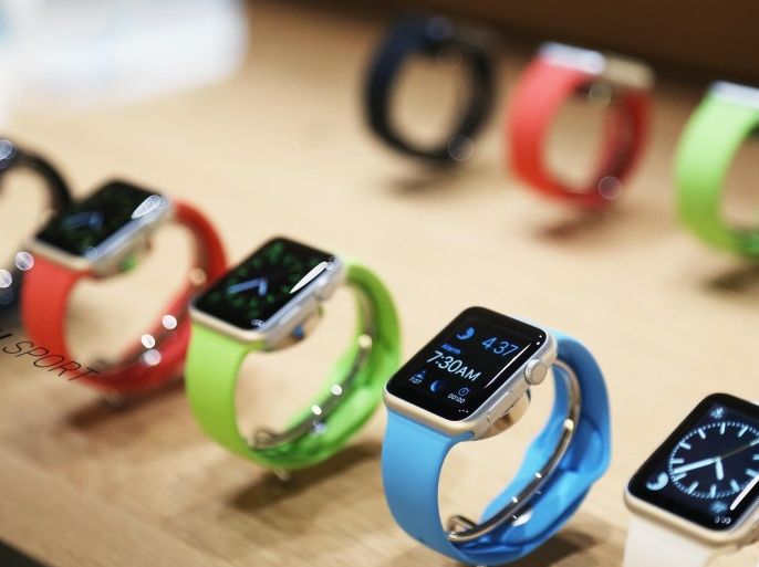 Apple watches are displayed following an Apple event in San Francisco, California in this March 9, 2015 file photo. About 40 percent of adult Apple iPhone owners in the United States are interested in buying the company's new Apple Watch, according to a new Reuters/Ipsos poll. REUTERS/Robert Galbraith/Files (UNITED STATES - Tags: SCIENCE TECHNOLOGY BUSINESS)