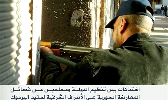 اشتباكات بين تنظيم الدولة وفصائل المعارضة بمخيم اليرموك