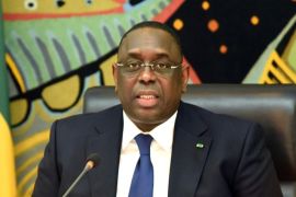 Senegalese President Macky Sall gives a press conference on March 17, 2015 at the presidential palace in Dakar during which he announced that he intended to submit to a referendum in 2016 a proposition to reduce the presidential term from seven to five years, enabling the organization of elections in 2017. AFP/PHOTO SEYLLOU