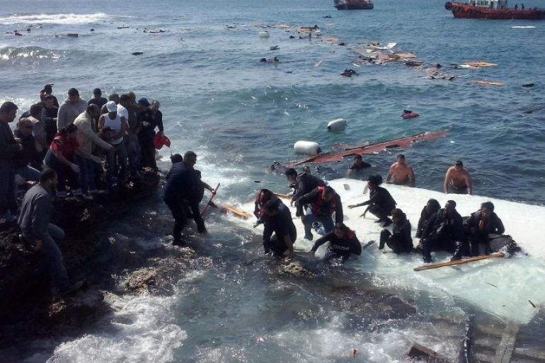 Illegal migrants arrving at Zefyros beach at Rhodes island, in Greece 20 April 2015. A ship with 200 undocumented migrants on board run aground at Rhodes central beach Zefyros. Most of the migrants fell into the water and managed to swim safely to the beach with the assistance of the locals. The ship run aground on rocks and according to initial estimations the vessel has severe damages. The bodies of a man, a woman and a child were recovered during a rescue operation.