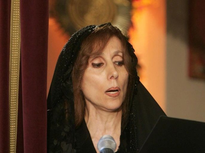 Famous Lebanese diva Fairuz sings lithurgical hymns 29 April 2005 at Good Friday mass at Saint Elias church in Mhaidseh village, east of Beirut.