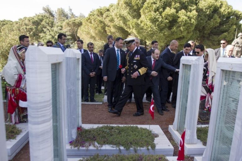 CANAKKALE, TURKEY - APRIL 24: Prince of Wales, Charles leaves red carnations on the symbolic martyrs' tombs after a commemoration ceremony marking the 100th anniversary of the Canakkale Land Battles on April 24, 2015 at the Canakkale Martyrs' Memorial, Turkey.