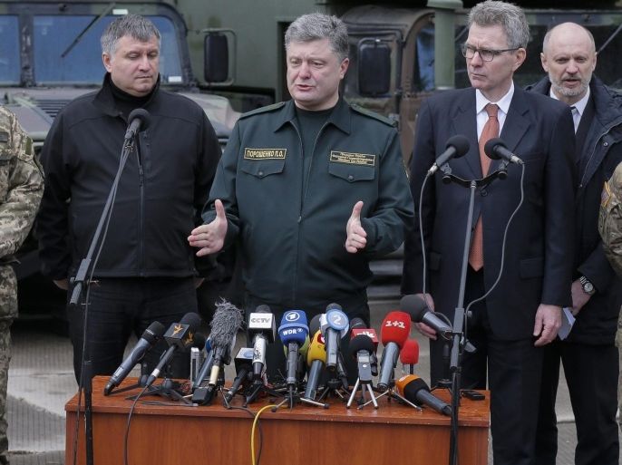 Ukrainian President Petro Poroshenko speaks during his press conference after the opening ceremony of joint military exercises near the western Ukrainian city of Lviv, Ukraine, 20 April 2015. Fearless Guardian â 2015 drill kicked off at the Yavoriv military base in western Ukraine, close to the border with Poland. Some 300 US soldiers from the 173th Airborne Brigade Combat Team of the US Army will train Ukrainian National Guard soldiers. The training program is part of a long-term strategy to improving Ukrainian defence potential and increasing of the professionalism of the Ukrainian Armed Forces.