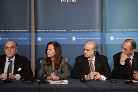 RR540 - Oeiras, -, PORTUGAL : Portuguese minister of home affairs Anabela Miranda Rodrigues (2nd L) sits with her counterparts Moroccan Mohamed Hassad (R), Spanish Jorge Fernandez Diaz (2nd R) and French Bernard Cazeneuve (L) as they give a joint press conference during the G4 summit meeting at Sao Juliao da Barra Fortress in Oeiras, near Lisbon on April 28, 2015. G4 ministers agreed today to offer more flexible and operational answers to common problems and strengthen police cooperation among the four countries. AFP PHOTO / PATRICIA DE MELO MOREIRA
