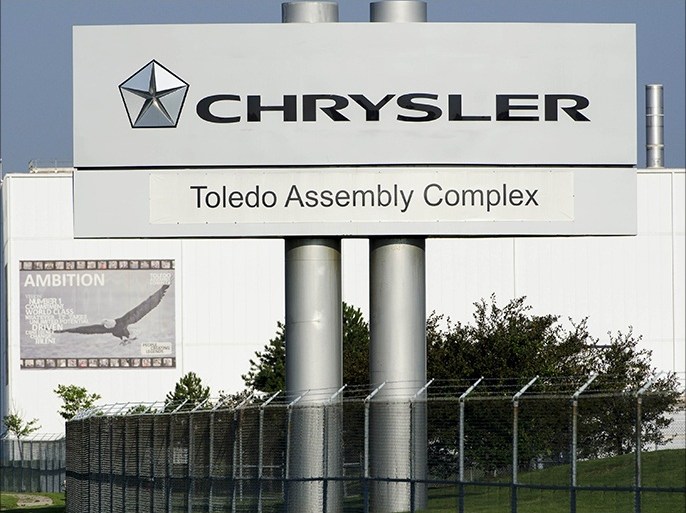 The Chrysler Toledo Assembly Complex has features banners (here Ambition) on the outside of the facility as part of its "Head, Heart and Hands" initiative to build community among workers at the plant. The new section of the plant will be used to produce the Jeep Cherokee. Toledo, Ohio July 18, 2013. REUTERS/James Fassinger (UNITED STATES - Tags: BUSINESS INDUSTRIAL TRANSPORT EMPLOYMENT