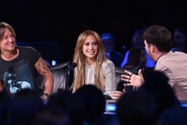 HOLLYWOOD, CA - APRIL 15: (L-R) Judges Keith Urban, Jennifer Lopez and Harry Connick Jr. onstage at FOX's 'American Idol XIV' Top 6 Revealed on April 15, 2015 in Hollywood, California.