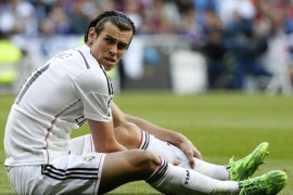 Real Madrid's Welsh midfielder Gareth Bale reacts after picking up an injury during the Spanish Primera Division match between Real Madrid and Malaga at Santiago Bernabeu stadium, in Madrid, Spain 18 April 2015.