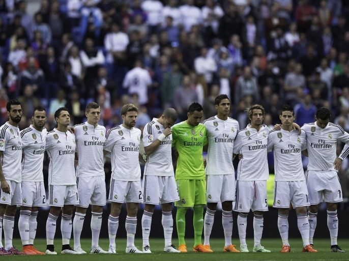 MADRID, SPAIN - APRIL 29: Real Madrid players observe one minute of silence for the victims of Nepal earthquake prior to start the La Liga match between Real Madrid CF and UD Almeria at Estadio Santiago Bernabeu on April 29, 2015 in Madrid, Spain.