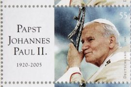 MAINZ, GERMANY - MAY 17: A new stamp showing the late Pope John Paul II, presented by German Post, is seen on May 17, 2005 in Mainz, Germany. (Photo by Ralph Orlowski/Getty Images) *** Local Caption ***