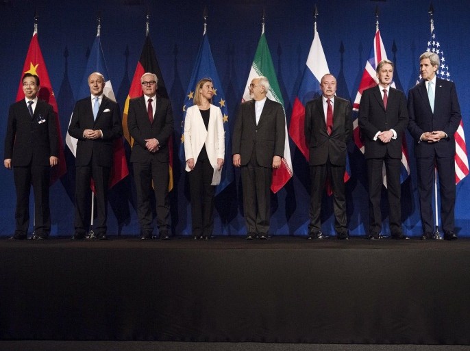 (L-R) Chinese Ambassador to the United Nations Wu Hailong, French Foreign Minister Laurent Fabius, German Foreign Minister Frank Walter Steinmeier, European Union High Representative for Foreign Affairs and Security Policy Federica Mogherini, Iranian Foreign Minister Javad Zarifat, Russian Deputy Political Director Alexey Karpov, British Foreign Secretary Philip Hammond and U.S. Secretary of State John Kerry arrive for nuclear talks at the Swiss Federal Institute of Technology in Lausanne (Ecole Polytechnique Federale De Lausanne) in Lausanne April 2, 2015. Iran and world powers reached a framework on curbing Iran's nuclear programme at marathon talks in Switzerland on Thursday that will allow further negotiations towards a final agreement. REUTERS/Brendan Smialowski/Pool