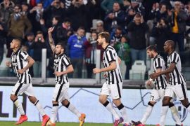 Juventus' Carlos Tevez (C) celebrates with his teammates after scoring a goal during the Italian Serie A soccer match between Juventus FC and Empoli FC at the Juventus Stadium in Turin, Italy, 04 April 2015.