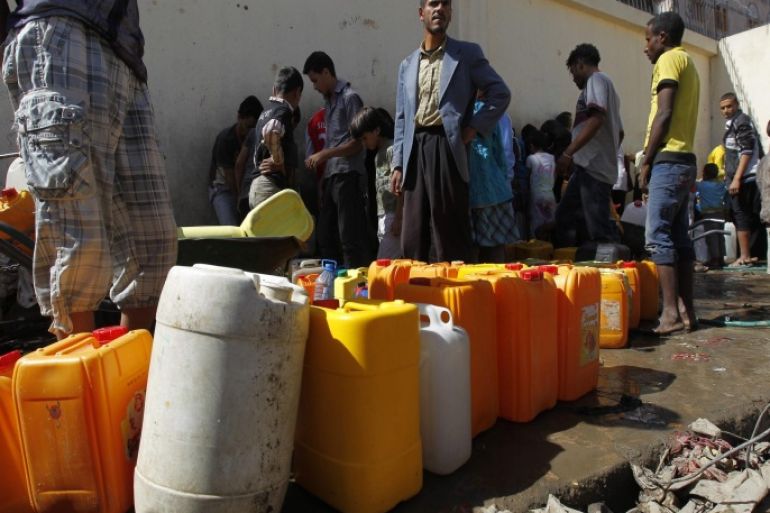 Yemenis wait to fill jerry cans with water from a philanthropist-provided water tap in Sana'a, Yemen, 16 April 2015. According to reports, many Yemenis were affected by the airstrikes carried out by the Saudi-led coalition against Houthi rebels, as they are facing shortage of water and food. Aid agencies warn of a looming humanitarian crisis as essential goods begin to run low in the impoverished country. Saudi Arabia and eight fellow Sunni Arab countries in late March launched an air campaign against Shiite Houthi rebels in Yemen, vowing not to stop until Yemen's internationally recognized President Abd Rabu Mansour Hadi, a Sunni, is reinstated.