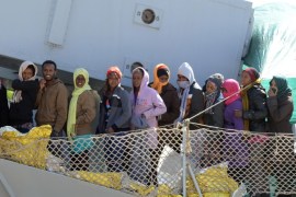 A boat transporting migrants arrives in the port of Messina after a rescue operation at see on April 18, 2015 in Sicily. A surge of migrants pouring into Europe from across the Mediterranean won't end before chaos in Libya is controlled, Italy's prime minister said yesterday, as the Vatican condemned a deadly clash between Muslim and Christian refugees on one boat. Italian authorities have rescued more than 11,000 migrants making the often deadly voyage from North Africa in the past six days, with hundreds more expected, the coastguard said. AFP PHOTO / GIOVANNI ISOLINO