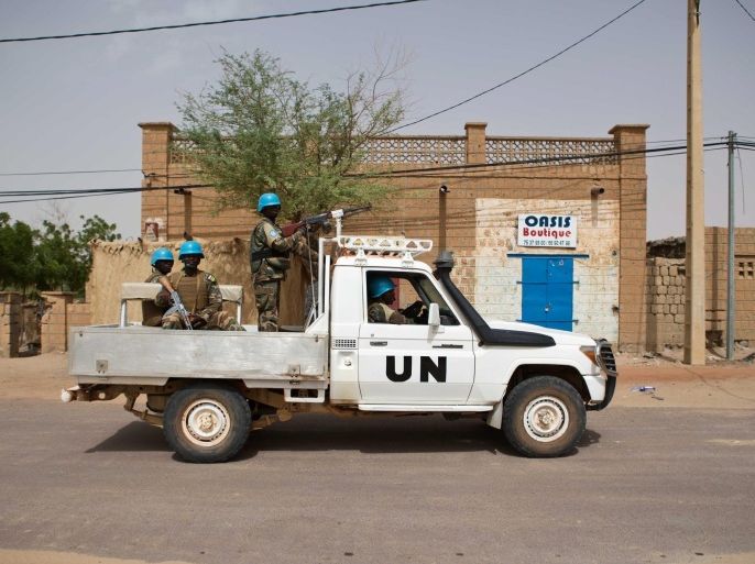 UN peacekeepers patrol the streets as Malians vote for the country's next president in Timbuktu, Mali, 28 July 2013. Voters besieged polling stations in Mali to elect a president as the poverty-stricken West African nation seeks to recover from a military coup and an Islamist insurgency that prompted France to send troops to its former colony.