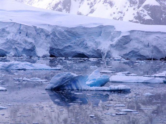 Iceberg floating in arctic water