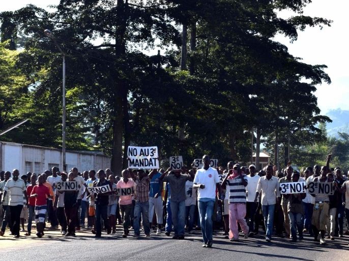 BUJUMBURA, BURUNDI - APRIL 28: Protestors close the road during clashes between police and opposition protesters in a street in the capital Bujumbura, Burundi on April 28, 2015. Hundreds of people in Burundi protested in the capital Sunday after the country's ruling party nominated President Pierre Nkurunziza to run for a third term.