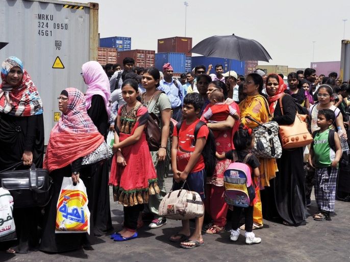 Indian people carrying their luggage prepare to depart for their country during an evacuation from Yemen at a sea port in the western port city of Hodeidah, Yemen, 06 April 2015. According to reports India evacuated 1052 of its nationals from the western Yemeni port of Hodeidah on 06 April, taking the total number of Indians rescued from the strife-torn country to nearly 3,300.