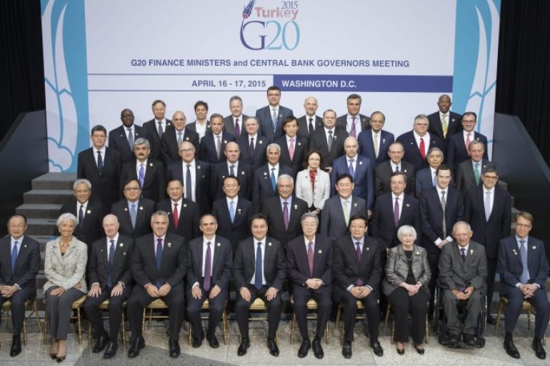 A handout photo provided by the International Monetary Fund (IMF) shows IMF Managing Director Christine Lagarde (2-L front row) posing with the G-20 Finance Ministers and Bank Governors for the Group photo following their meeting at the IMF Headquarters in Washington DC, USA, 17 April 2015. EPA/Steve Jaffe / HANDOUT