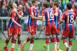 MUNICH, GERMANY - APRIL 11: Thomas Mueller (C) of Munich and his teammates celebrate their team's third goal during the Bundesliga match between FC Bayern Muenchen and Eintracht Frankfurt at Allianz Arena on April 11, 2015 in Munich, Germany.