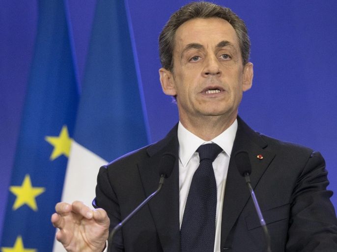 (FILE) A file picture dated 29 March 2015 shows former French President and President of right wing party Union pour un Mouvement Populaire (UMP - Union for a Popular Movement) Nicolas Sarkozy delivering a speech during the press conference organized at the party headquarter in Paris, France. French court has designated on 01 April 2015 Nicolas Sarkozy as assisted witness following a hearing about his 2012 presidential campaign finance scandal.