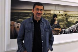 ANKARA, TURKEY - DECEMBER 25: Palme d'Or awarded Turkish director Nuri Bilge Ceylan pose during the opening cocktail of his photograph exhibition named 'Panaromic view' at CerModern Exhibition Center in Ankara, Turkey on December 25, 2014. Ceylan exhibits 49 pieces of photograph taken by him since 2003.