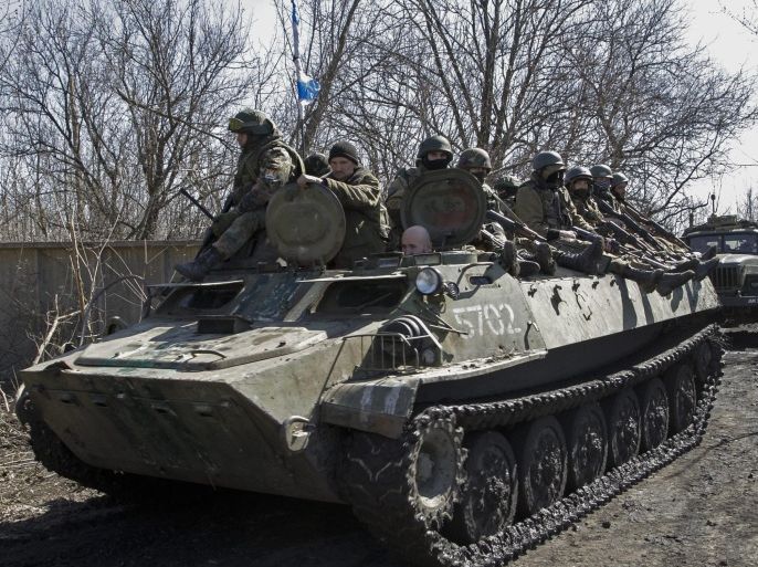 Pro-Russian rebels drive on an armored military vehicle near city of Donetsk, Ukraine, 10 April 2015. Russian Foreign Minister Sergei Lavrov plans to attend talks on the Ukraine crisis in the German capital Berlin, reports stated on 09 April. Lavrov is scheduled to meet on 13 April with his counterparts from Germany, France and Ukraine to discuss the implementation of the Minsk peace accord for the war-torn country.