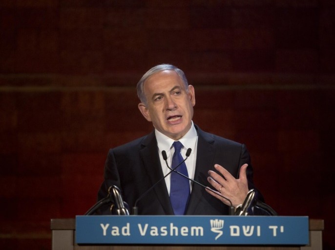 Israeli Prime Minister Benjamin Netanyahu speaks at the opening ceremony of the Holocaust Remembrance Day at the Yad Vashem Holocaust Memorial in Jerusalem, Wednesday, April 15, 2015. (AP Photo/Sebastian Scheiner)