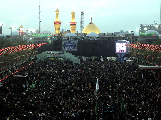 epa04526715 Shi'ite pilgrims gather at Imam Hussein shrine during the Arbain ceremony in the holy city of Karbala, southern Iraq on 12 December 2014. Hundreds of thousands of Shiite worshippers attend religious festival ceremonies in Karbala on the anniversary of the 40th day after the martyrdom of Imam Hussein, grandson of Prophet Muhammad who was killed in the Battle of Karbala in 681AD. EPA/ALAA AL-SHEMAREE