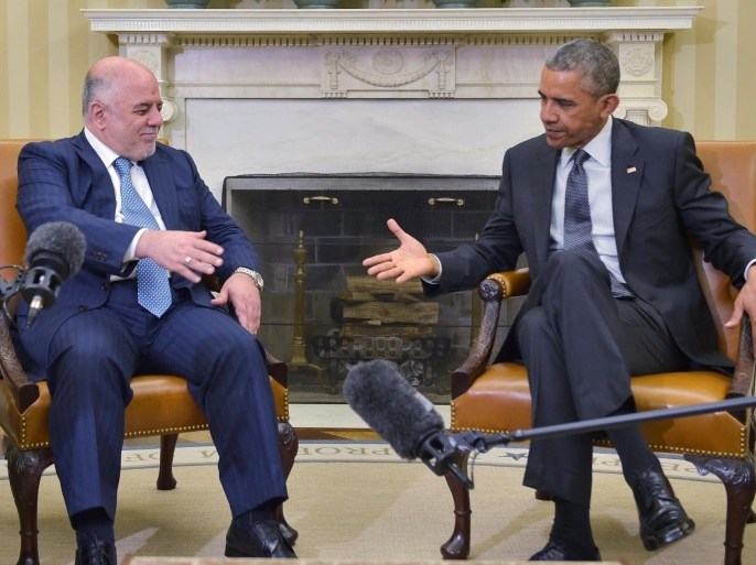 US President Barack Obama shakes hands with Iraqi Prime Minister Haider al-Abadi during a bilateral meeting in the Oval Office on April 14, 2015 in Washington, DC. President Barack Obama met Iraqi Prime Minister Haider al-Abadi in the White House on Tuesday and hailed the progress he said the US-backed Iraqi forces were making against the Islamic State group. AFP PHOTO/MANDEL NGAN