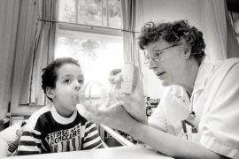 UNDATED: In this undate image a child is helped with an asthma inhaler. A report released on May 3, 2005 to mark World Asthma Day claims that one person dies from asthma every hour in Western Europe.
