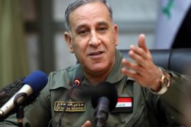 Iraqi Defence Minister Khaled al-Obeidi gestures during a press briefing with members of the foreign media on March 18, 2015, in Baghdad. Iraq's offensive to retake Tikrit from the Islamic State group was stalled this week because of streets and buildings rigged with booby trap bombs and by the several hundred jihadists still holding out there as well as to avoid casualties and to protect infrastructure, Iraqi officials have said. AFP PHOTO/ ALI AL-SAADI