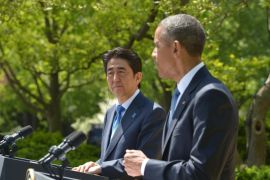 US President Barack Obama and Japanese Prime Minister Shinzo Abe hold a joint press conference in the Rose Garden at the White House on April 28, 2015 in Washington, DC. AFP PHOTO/MANDEL NGAN