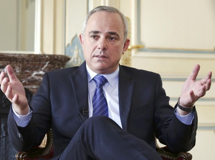 Israeli Intelligence Minister Yuval Steinitz gestures as he speaks during an interview with The Associated Press in Paris, Monday, March 23, 2015. Steinitz said Monday that dialogue with France over Iran's nuclear program "has proven in the past that it was productive" and makes this week's last-minute diplomatic mission to Paris worthwhile. (AP Photo/Remy de la Mauviniere)