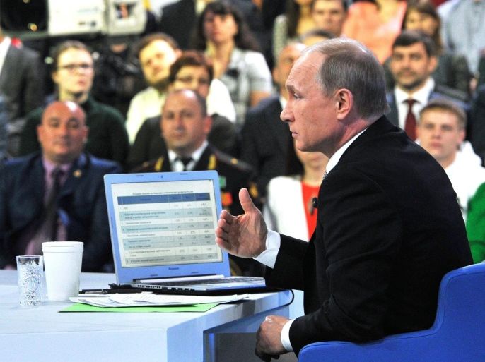 Russian President Vladimir Putin holds an annual Q&A (question-and-answer) nationwide live-broadcast TV and radio session in Moscow, Russia, 16 April 2015. During the session Vladimir Putin said that lifting of international sanctions should not be expected in near future and Russia should make use of them to promote its own development. EPA/MIKHAIL KLIMENTYEV / RIA NOVOSTI / KREMLIN POOL MANDATORY CREDIT