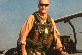 In this undated photo provided by the Norgren family, Marine Capt. Chris Norgren poses for a photo when he was in Navy flight school. Ronald Norgren, the father of Chris Norgren, the pilot flying a helicopter that went down in Nepal and disappeared Tuesday, May 12, 2015, says U.S. Marine officials have notified the family that the wreckage was found but they haven’t confirmed the identities of any bodies. (Theresa Norgren via AP)