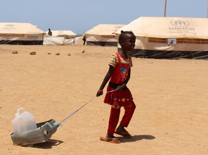 OBOCK, DJIBOUTI - MAY 18: A Yemeni kid, fled the air strikes that have devastated their country, takes shelter at UNHCR's refugee camp site in Obock region of Djibouti on May 18, 2015. The UN expects more than 15,000 Yemeni refugees will arrive in the next six months in Djibouti, where the government says it will offer them what support it can.